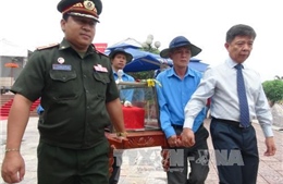 Lễ tiếp nhận, an táng hài cốt liệt sĩ Việt Nam hy sinh tại Lào 